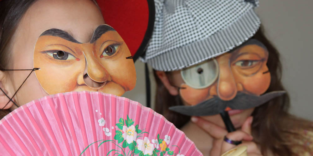 Teenagers in masks at Footlights Theatre Workshop